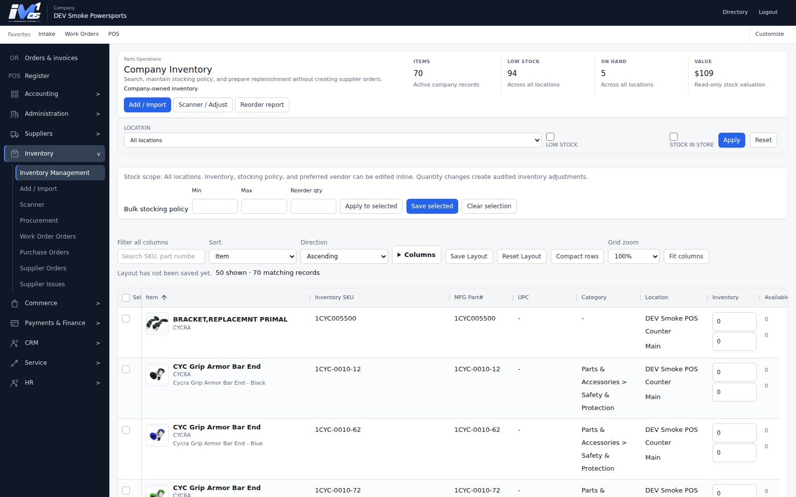 Actual iM1 OS Company Inventory workspace showing motorcycle parts, stocking-policy controls, location quantities, and reorder reporting